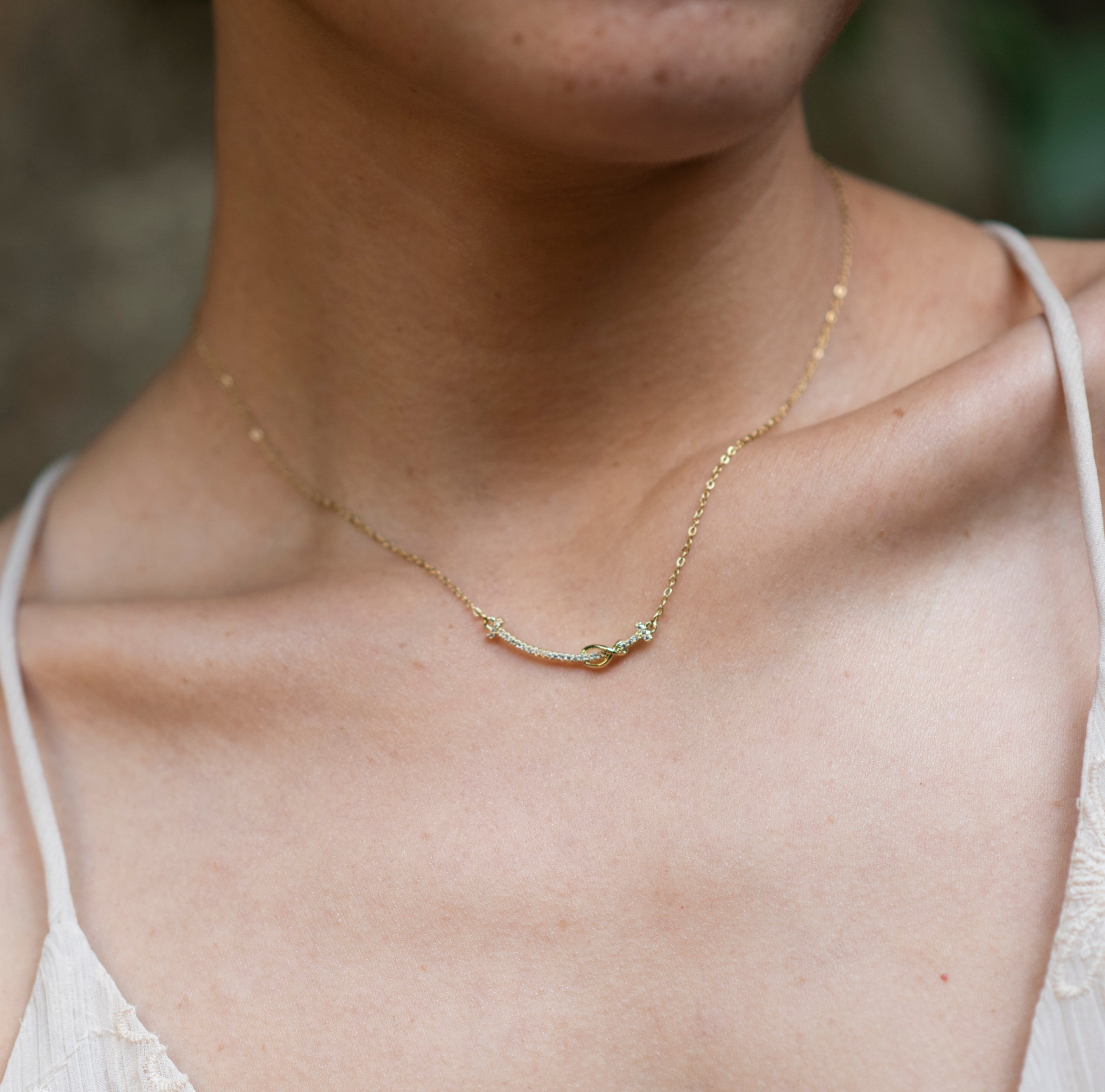 Infinity stone studded necklace